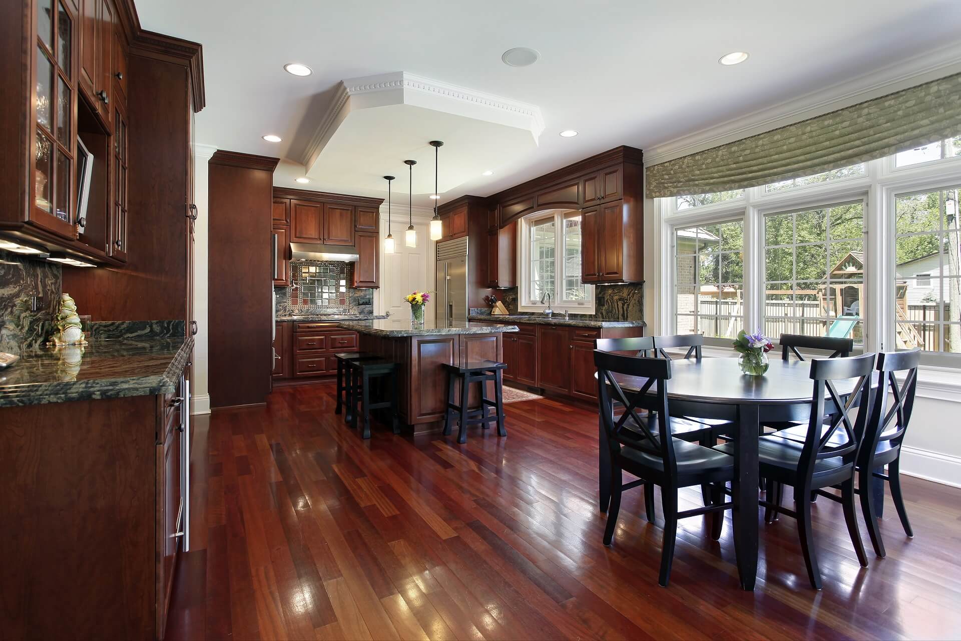 beautiful kitchen with dark wood floors